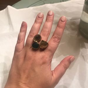 Green and neutral stone ring.